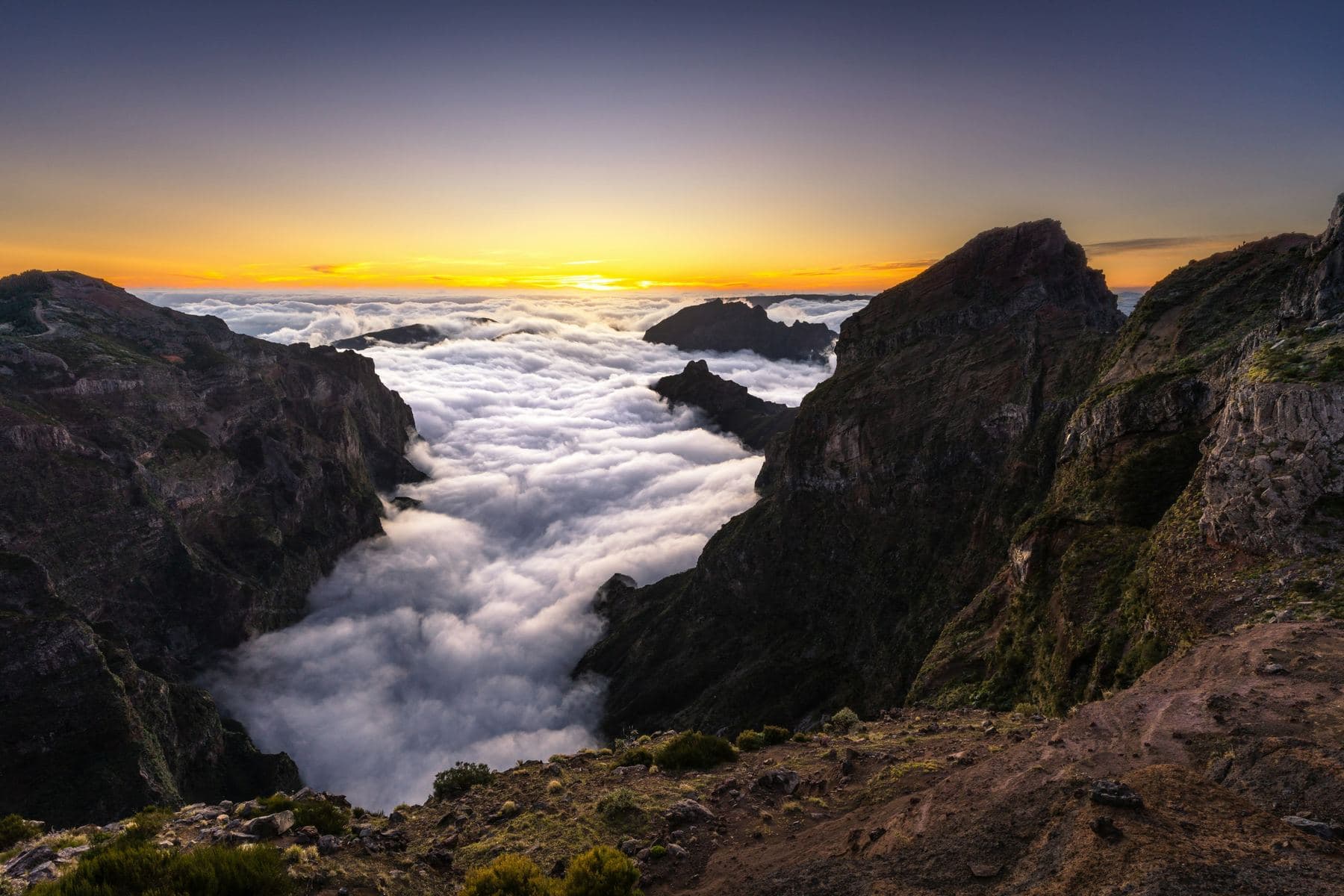 Sunset over a sea of clouds