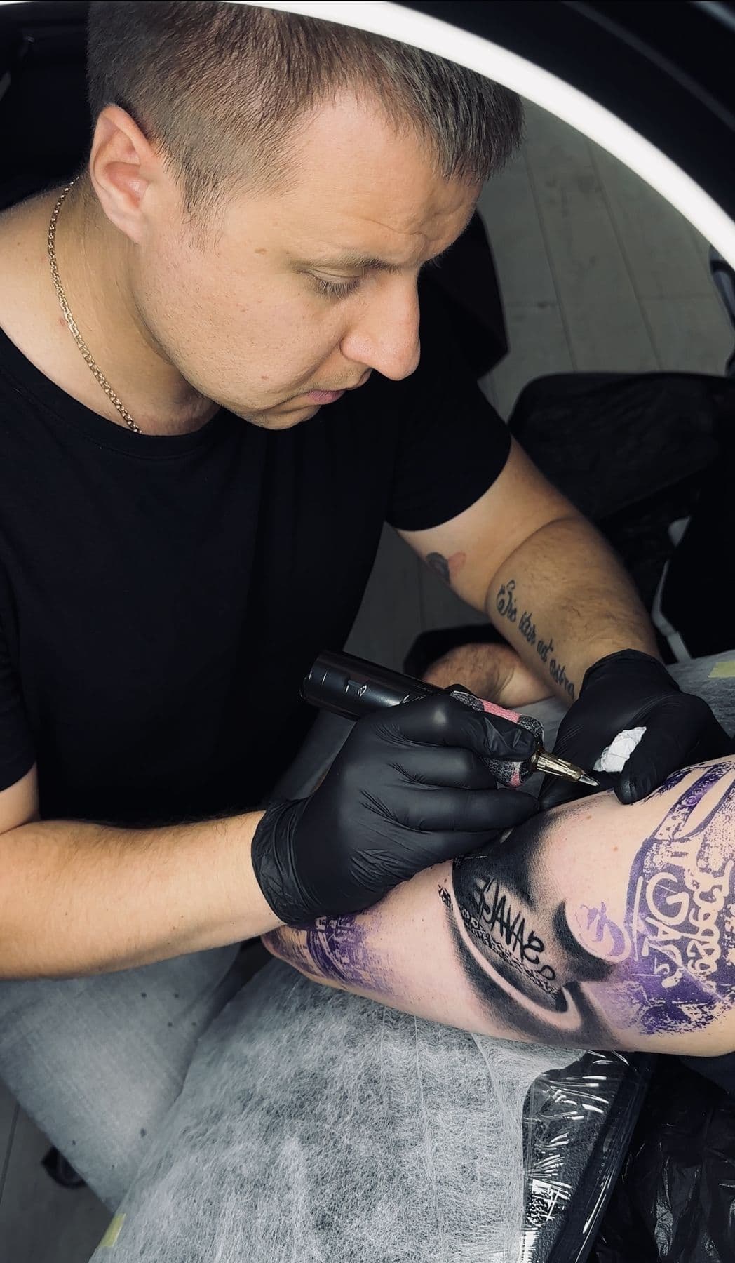 Yuri Astra tattooing